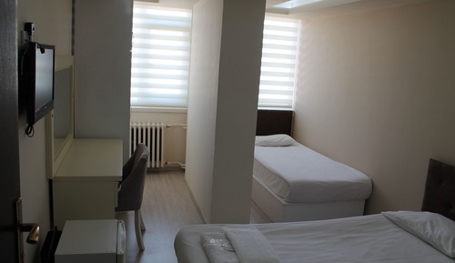 Chambre Triple, 3 lits une place