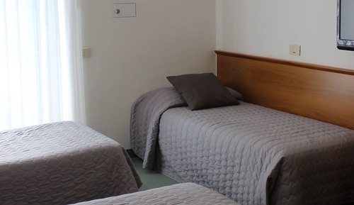 Chambre Quadruple, 1 chambre (4 single beds)
