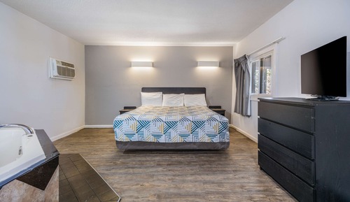 Suite Deluxe, 1 très grand lit, non-fumeurs, bain à remous