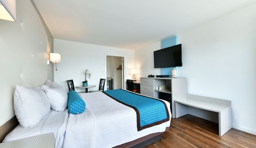Chambre Simple Classique, 1 très grand lit, accessible aux personnes à mobilité réduite