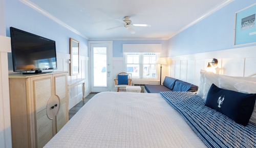 Chambre Standard, 1 très grand lit, vue partielle sur l'océan