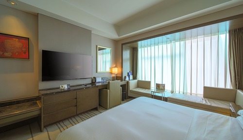 Chambre Deluxe 1 très grand lit king-size