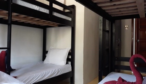 Chambre Quadruple, plusieurs lits, vue partielle sur l'océan, en bord de plage