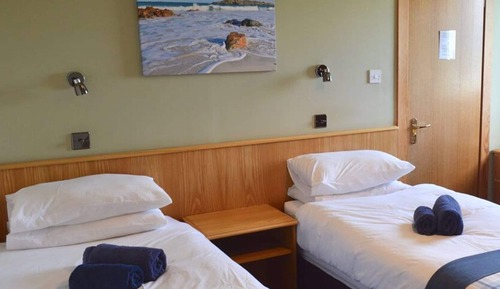 Chambre avec lits jumeaux, vue mer