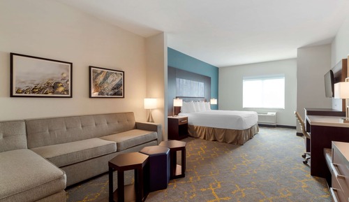 Suite, 1 très grand lit et 1 canapé-lit, non-fumeurs, réfrigérateur et four à micro-ondes