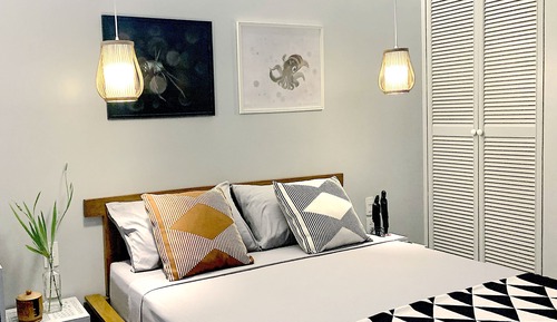 Chambre Deluxe, 1 grand lit, vue partielle sur l'océan