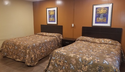 Chambre Double, 2 grands lits, fumeurs