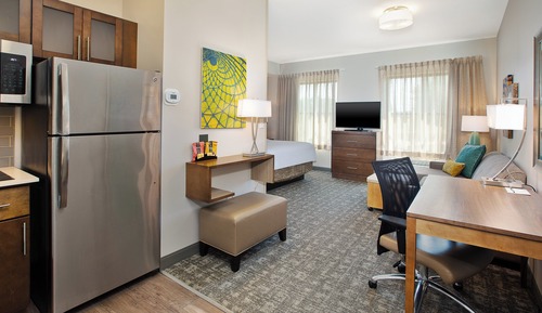 Suite Studio, 1 grand lit, accessible aux personnes à mobilité réduite, cuisine (Communications)