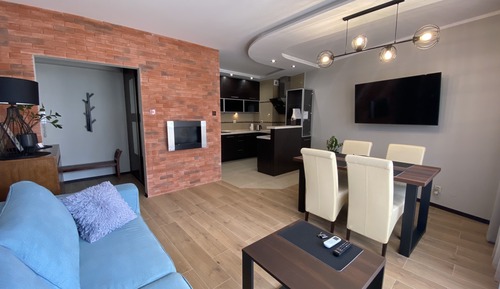 Appartement Confort, 1 très grand lit et 1 canapé-lit, vue cour intérieure