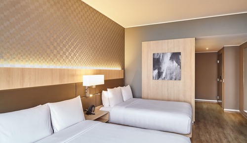 Chambre Deluxe, 2 lits doubles, vue partielle sur l'océan