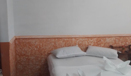 Chambre Triple Classique, plusieurs lits, vue plage