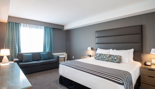 Suite Majestueuse, 1 très grand lit et 1 canapé-lit, coin cuisine