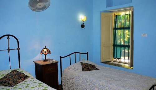 Chambre Triple Exclusive, plusieurs lits, non-fumeurs, vue jardin