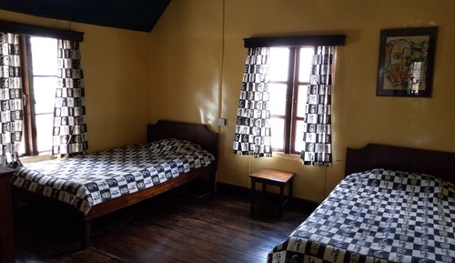 Chambre Économique Double ou avec lits jumeaux, 2 lits une place