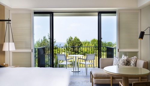 Chambre Deluxe, 1 très grand lit, vue partielle sur l'océan