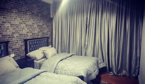 Chambre Triple, 3 lits une place