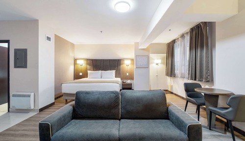Suite, 1 très grand lit, non-fumeurs, cuisine (with Sofabed, Full Kitchen)