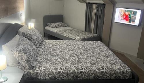 Chambre Quadruple Deluxe