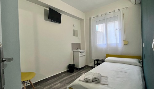 Chambre Simple, salle de bains commune