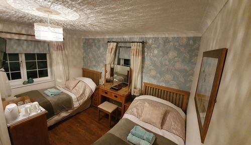 Chambre avec lits jumeaux