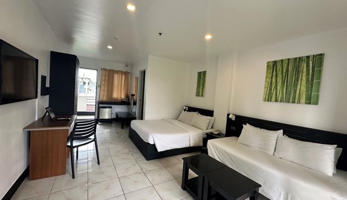 Chambre Triple Exclusive, plusieurs lits, accès piscine, vue jardin