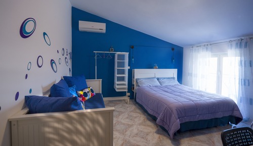 Chambre Double Confort, 1 grand lit et 1 canapé-lit