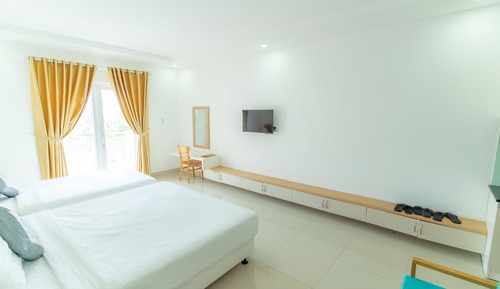 Chambre Triple Deluxe, vue partielle sur la mer