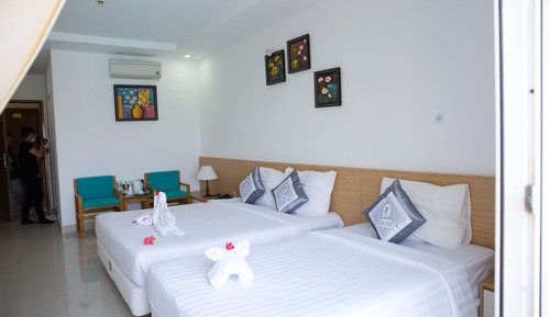 Chambre Triple Deluxe, vue piscine