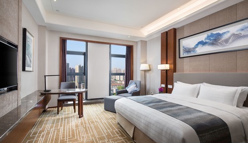 Chambre Deluxe, 1 très grand lit, fumeurs