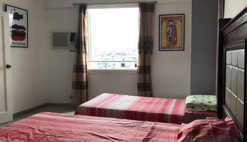 Appartement, plusieurs lits, vue ville, en angle