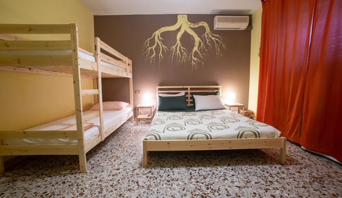 Chambre Quadruple, plusieurs lits, salle de bains commune (Terra)
