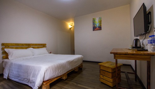 Chambre Deluxe, 1 très grand lit