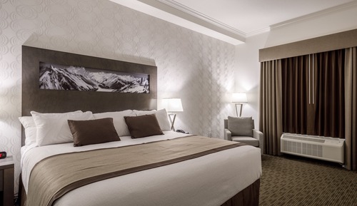 Suite, 2 chambres, non-fumeurs, réfrigérateur et four à micro-ondes (1 King and 2 Queen)