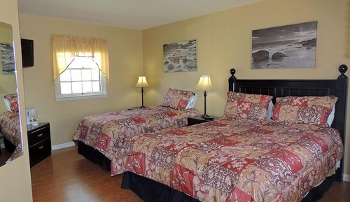 Chambre, plusieurs lits