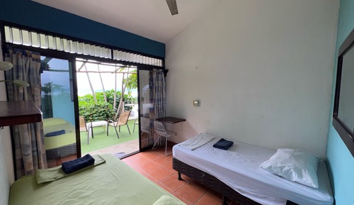 Chambre avec lits jumeaux, 2 lits une place, vue baie