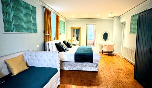 Chambre Quadruple Deluxe, plusieurs lits