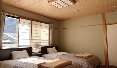 Chambre Deluxe avec lits jumeaux (Private Bathroom)