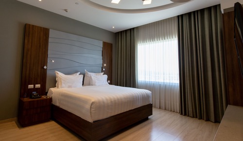 Chambre Exécutive, 1 très grand lit