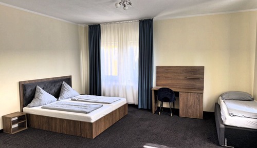 Chambre Triple Deluxe, vue cour intérieure