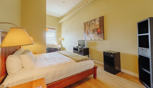Chambre Deluxe, 1 très grand lit et 1 canapé-lit