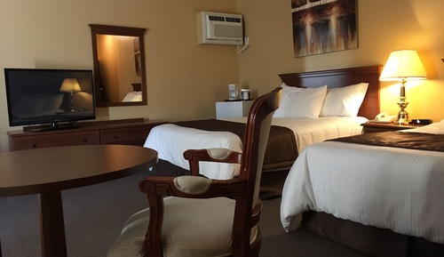 Chambre Deluxe, 2 grands lits, baignoire à jets