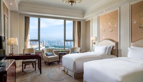 Chambre Luxe, 2 lits une place, accès au salon club