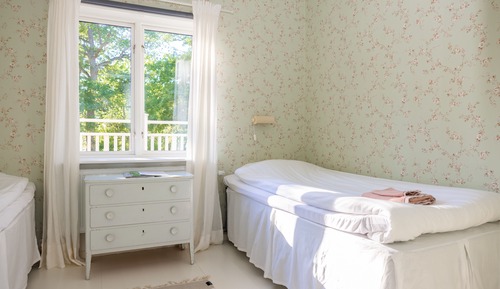 Chambre Double, salle de bains commune, vue océan