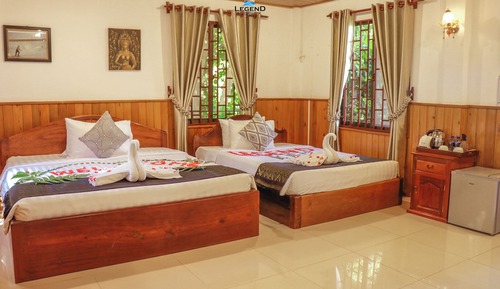 Chambre Standard avec lits jumeaux, balcon, vue jardin
