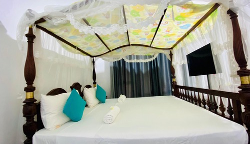 Chambre Triple Standard, vue jardin
