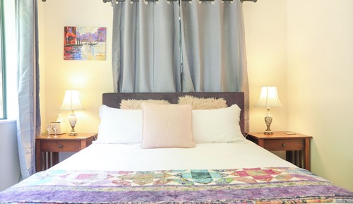 Suite, 1 grand lit, four à micro-ondes, vue plage
