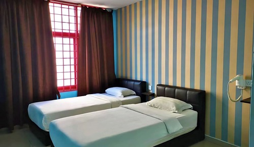 Chambre avec lits jumeaux