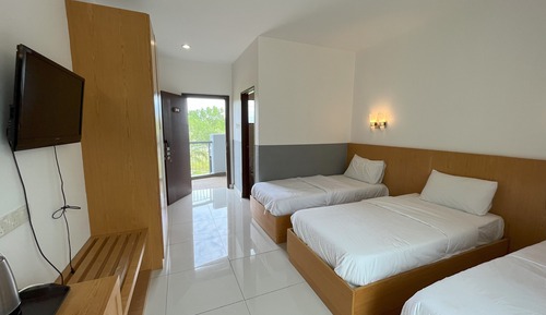 Chambre Triple Deluxe, vue jardin