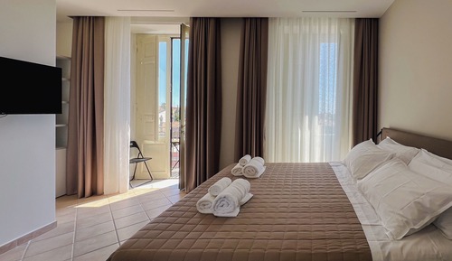 Chambre Triple Deluxe, vue partielle sur la mer