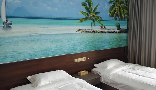 Chambre avec lits jumeaux, vue océan